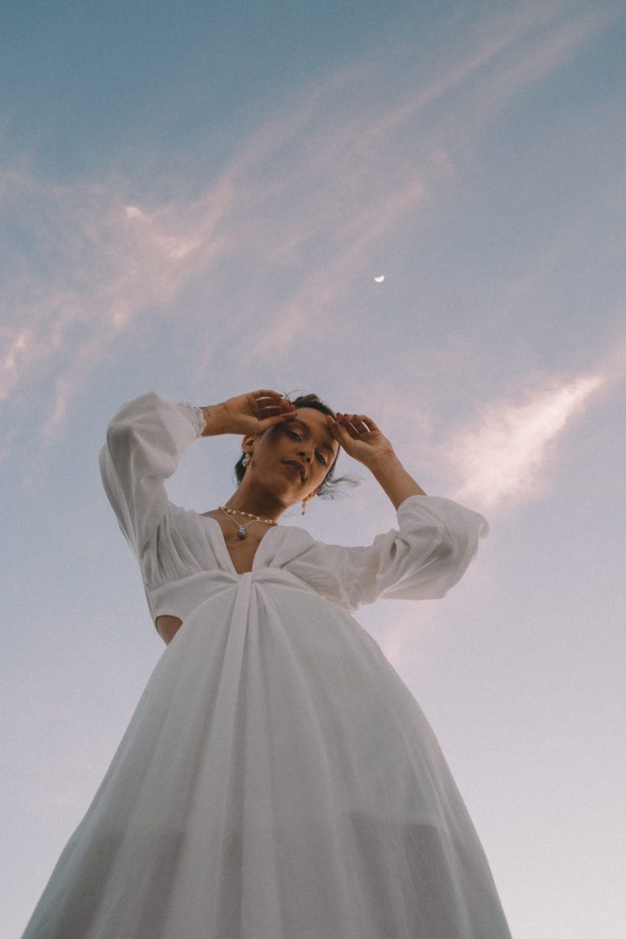 low-angle-photo-of-woman-wearing-white-dress-3612264-scaled-e1581420307598